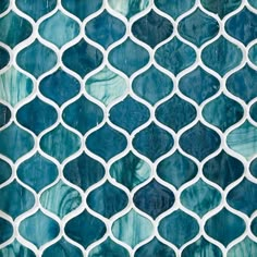 a blue and white tile pattern with wavy lines