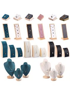 several different types of necklaces on display in wooden boxes and cases with matching clasps