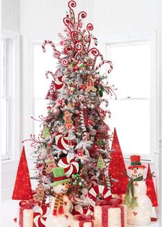 a christmas tree decorated with candy canes and ornaments