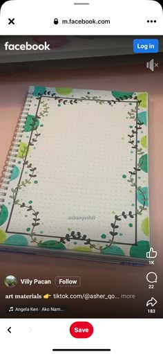 an open notebook sitting on top of a table