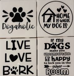 four ceramic coasters with black and white designs on them, one has a dog's paw