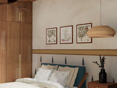 a bed sitting in a bedroom next to a wooden dresser and lamps on the wall