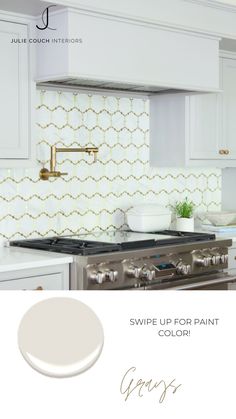 a kitchen with white cabinets and gold accents on the backsplash is featured in an article titled swipe up for paint color