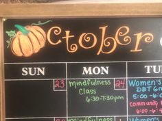 a chalk board with some writing on it that says october and the dates are written in cursive