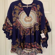 Anthropologie Blouse-New With Tag And Never Been Worn! Blue Floral Print V-neck Blouse, Flowy Printed Top For Brunch, Blue Flowy V-neck Top, Casual Boho Print Tunic Top, Casual Boho Print Rayon Tops, Casual Rayon Tops With Boho Print, Bohemian Blue V-neck Tops, Blue Tunic Tops For Fall, Spring Beach Blouse In Blue