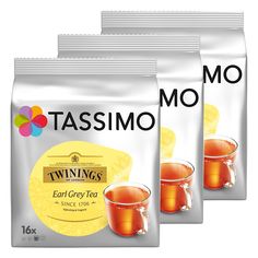 three bags of tea sitting next to each other