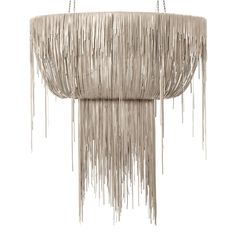 a chandelier with fringes hanging from it's sides on a white background