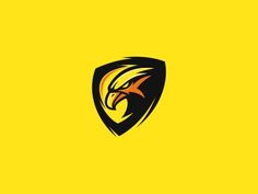 an eagle logo on a yellow background with black and red colors, the head of an animal