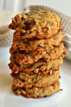 a stack of cookies sitting on top of a white plate