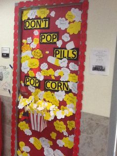 a door decorated with popcorn and paper flowers