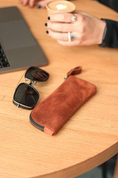 This genuine leather sunglasses case is a perfect blend of style and functionality, designed as a minimalist glasses protector to keep your eyewear safe and scratch-free. This elegant sunglasses pouch is an ideal gift for your girlfriend, combining practicality with a touch of sophistication. As a versatile piece among leather accessories, this eyeglass case or eyeglass sleeve offers a sleek and durable solution for carrying your glasses securely wherever you go. Material: genuine leather Size: Minimalist Glasses, Leather Sunglasses Case, Elegant Sunglasses, Sunglasses Pouch, Gifts For Your Girlfriend, Eye Wear Glasses, Eyeglass Case, Gift For Girlfriend, Glasses Case