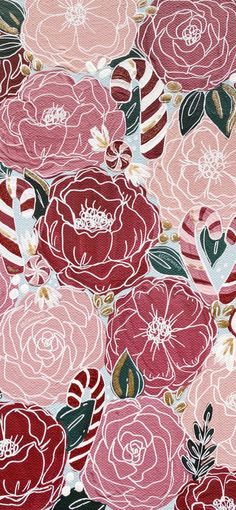 a pink and red flowered fabric with many different flowers on the top of it