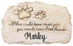 a stone with two paw prints on it that says, if we could have loved you, you would have lived forever marley