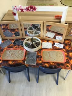 an assortment of decorative items sitting on top of a table