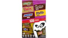 three different types of candy bars in a package on a white background with the words, twix and men's munchs