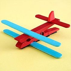 a website page with an image of a red and blue toy airplane on top of it