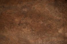 an image of a brown background that looks like stone