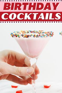 a hand holding a martini glass with sprinkles on it and the words birthday cocktails above it