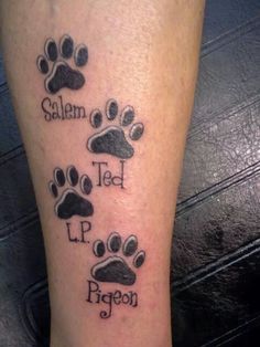 a dog paw tattoo with the words salem, teal, l p pigeon on it