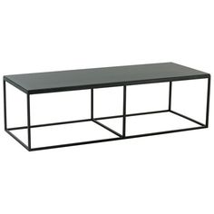 a black coffee table sitting on top of a white floor next to a metal frame