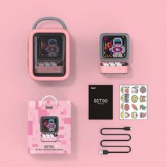 an electronic device and accessories are laid out on a pink surface with the words dittoo printed on it