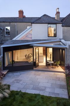 a modern house with an open patio area