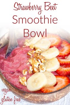 strawberry beet smoothie bowl with yogurt, granola and sliced bananas