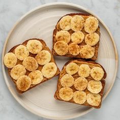 three slices of toast with bananas on top