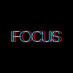 the word focus in red, blue and green neon letters on a black background that reads focus