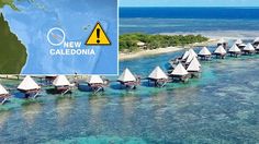 an island with many huts on it and a sign that says new caledonia