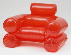 a red balloon shaped like a couch