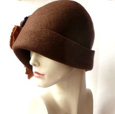 Felt hat cloche hat felt hat felted hat Retro hat La belle epoque Art Deco 1920s hat Art Hats Brown hat cloche hat 1920's woman hat roses Wool Merino wool Handmade Great, very flattering brown hat with roses in shades of brown color ! Soft and durable ! Adapts to the head ! Special and unique ! Sophisticated and elegant ! As the base for my works I use great materials like highest quality Australian merino wool (18 micro). All my works are made by hand in the process of long-term, hand felting M Fitted Felt Cap For Fall, Fitted Fall Felt Cap, Fitted Brown Felt Hat, Vintage Felt Cloche Hat For Winter, Fitted Wool Cloche Hat, Retro Cloche Felt Hat For Winter, Retro Winter Cloche Felt Hat, Fitted Felt Mini Hats For Winter, Felt Mini Hats For Winter