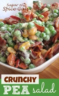 a bowl filled with peas and bacon on top of a wooden table