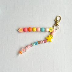 a keychain that has some beads on it