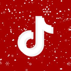 a red background with white snowflakes and the letter j on it's side