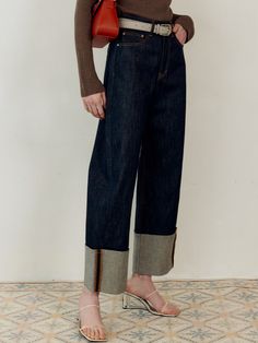 Editor's Notes This wide leg denim pants have rolled-up hems in contrasting color that address unique casual mood. Its relaxed silhouette giving comfortable fit it can be easily matched for daily outfit.- Rounded side line- Contrasting color at rolled up hem- Leather label and logo engraved rivet buttons- Wide relaxed fit- Five pocket detailsMeasurements(in.)- Size: S / M / L - Waist: 13.2 in. / 14 in. / 14.7 in. - Hip: 19 in. / 19.8 in. / 20.5 in. - Front Rise: 12 in. / 12.4 in. / 12.8 in. - Thigh: 12.6 in. / 13.4 in. / 14.1 in. - Hem: 9 in. / 9.8 in. / 10.5 in. - Total Length: 37.4 in. / 37.8 in. / 38.1 in. Model info: Height 5' 7.4, Bust 30 in., Waist 22.8 in., Hip 33.8 in., Wearing Size SComposition & Care- 100% Cotton- Use a Ph neutral Tv Nook, Wide Leg Denim Pants, Nautical Outfits, Trend 2024, Duffle Coat, Leather Label, Wide Leg Denim, Roll Up, Daily Outfits