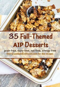 a tray filled with granola and raisins on top of a wooden table