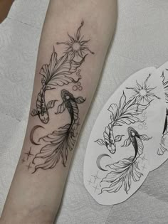 a woman's arm with a tattoo design on it, next to a pair of scissors