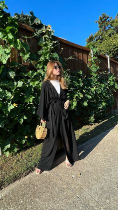 "Black Oversized Kimono, Hand black kimono robe, Long unisex robe, Black Kimono, boho robe, Beach Coverup, gift for her Name: Black Swan kimono robe  - Beautiful handcrafted kimono robe - Sizes: One size -Oversize all fit 👈🏽 - Chest & Hip: 60 inches. Length: 55inches. 👈🏽 - Removable waist tie closure/belt - Side slits at hem - two POCKETS😊 - 100% Soft Rayon, lightweight - Hand wash in cold water, hang dry. - You can wear it at the beach, or even from day till night on your holidays! It's also suitable for relaxing moments at home - At first, you may feel the material is not so soft as described or may have some strange smell because of the process. But the difference will be visible after the first wash. You will get soft and super comfy ready-to-go wear. -Ethically made 🙌🏽 fairly t Bohemian Long Black Robe, Bohemian Black Long Robe, Long Black Bohemian Robe, Black Long Bohemian Robe, Black Bohemian Kimono For Beach Cover-up, Black Bohemian Robe With Kimono Sleeves, Bohemian Black Robe With Kimono Sleeves, Long Black Abaya For Vacation, Long Black Abaya For Spring