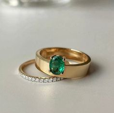 Natural Emerald Ring in 18k Gold | with Matching Diamond Band | Statement Ring | Engravable Ring | 18K Gold Jewelry | This is NOT a Set Your Favorite Daily Dose Of Jewelry .Beautiful 18K yellow gold ring with one round cut emerald at the face of the ring. Perfect high end fashion ring for everyday use. Would also perfectly match big occasions. Specification Metal: 18K yellow gold Emerald Ring Weight: 3.5g appro. (varies by size) Diamond Band Weight: 1.2g appro. (varies by size) Main Stone: Emera Emerald Ring Thick Band, Timeless Green Ring As Gift, Timeless Green Rings As Gift, Timeless Green Rings As Gifts, Timeless Green Ring Gift, Classic Yellow Gold Emerald Wedding Jewelry, Luxury Emerald Ring With Round Band, Luxury Emerald Round Band Rings, Luxury Yellow Gold Ring For May Birthstone