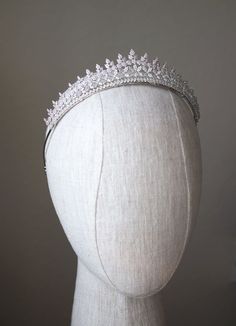 Stunning petite yet ultra regal bridal tiara embellished with dazzling simulated diamonds | wedding inspo, wedding, wedding ideas, wedding hair, bridal hair styles, bridal hair accessories, bridal headpieces, headpieces for brides, bridal tiara, bridal crown, tiaras and crowns, headpieces for brides, luxury jewelry, diamond crown, bridal hair ideas, sparkly tiaras, sparkly wedding tiara, diamond tiara, maximalist wedding, glamorous wedding, women's jewelry and accessories #bridaltiara #bridetobe Simple Wedding Tiara, Delicate Tiara, Diamond Tiara Wedding, Luxury Jewelry Diamond, White Tiara, Headpieces For Brides, Small Tiara, Tiara Veil, Vintage Mexican Wedding