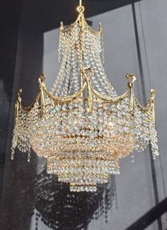 a fancy chandelier hanging from the ceiling