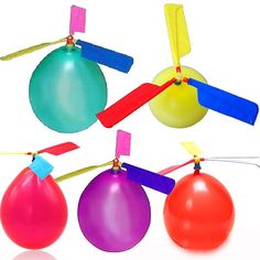 three balloons with propellers attached to them