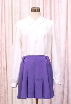 Mini lenght pastel purple pleated sport skirt Label: J'Elle SPORT made in Australia Size on Label :14 Best Fit:AU12 /L Measurements in CENTIMETRES with the garment lying flat: FabricPolyester Shoulder to shoulder  Length :40 Bust : Waist :37 - 41 Hips :up to 54 Sleeve : Condition :Very Good Vintage Condition Please Compare Measurements with a Similar Item of Clothing *Measurements are taken from one side of the garment while lying flat (please double for full circumference). *The "best fit" size Sport Skirt, Sports Skirt, Violet Pastel, Pastel Lavender, Cowboys Shirt, Sports Skirts, Pastel Purple, Shoulder Length, Leather Bag