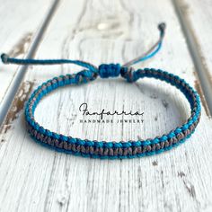 These lovely bracelet is made of waterproof cord. Water Resistant The bracelet closes to around 6" and opens to 9". Blue Resizable Braided Bracelet For Everyday, Everyday Blue Resizable Braided Bracelets, Casual Blue Braided Bracelets, Adjustable Woven Blue Bracelets, Blue Hand-strung Braided Bracelets For Beach, Braided Bracelets, Team Spirit, Arm Band, Game Day