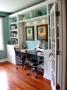 a home office with two chairs and a desk