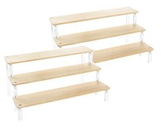 two wooden shelves sitting next to each other