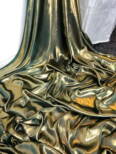 "1 mtr dark green/gold shimmer on satin fabric This is quality fabric and is silky satin fabric It is 58\" wide (147cm) This is ideal for dress making lining,bridal dress lining, waiste coat,decorations,table runners, and many other projects If more than one quantity is bought it will be sent in one continous length All items are dispatched within one working day (Please note i try my best to get exact color of the fabric there might be a slight different in color due to different montior screens and camera lighting) Any questions feel free to ask and please take time to look at my shop" Lame Fabric, Elegant Fabric, Bridal Fabric, Club Wear, Teal And Gold, Metallic Foil, Gold Shimmer, Chiffon Fabric, Green Gold