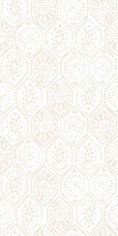 a white and beige wallpaper pattern with hexagonal shapes