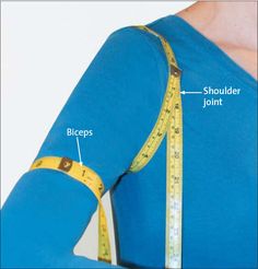 a woman with a measuring tape around her waist and the measurements on her shirt are shown